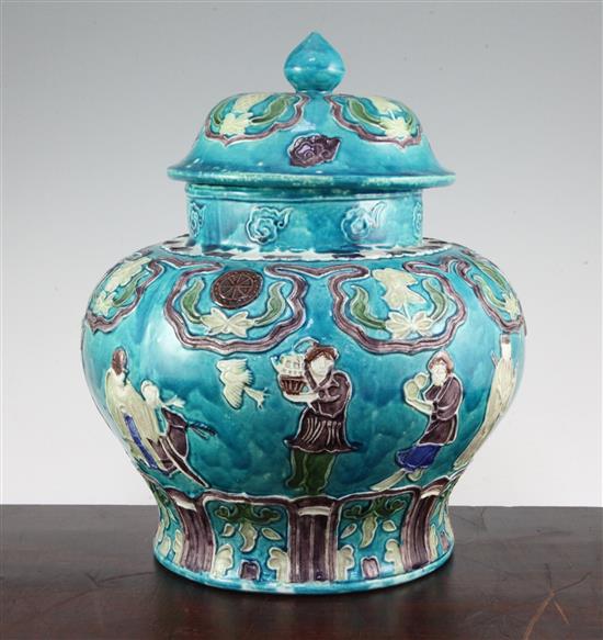 A Chinese Fahua decorated baluster jar and cover, 18th / 19th century, 32cm.